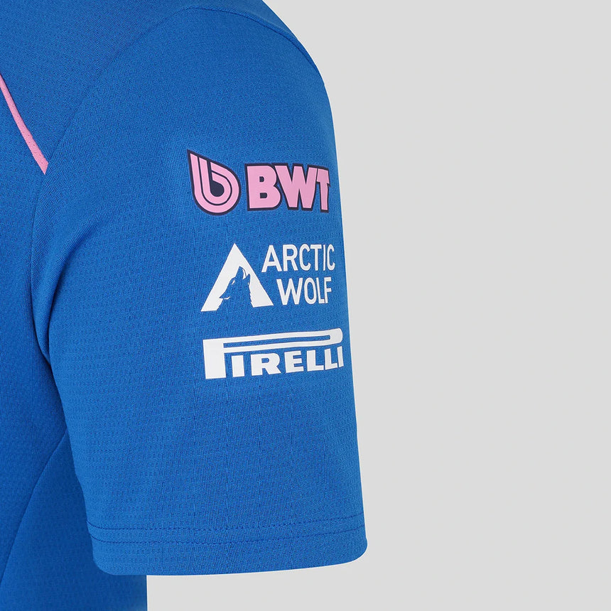 Kék női póló, BWT és Pirelli logó a bal ujján.